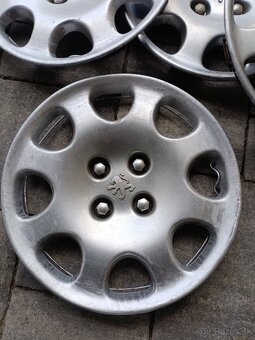 Predám puklice Peugeot - 2