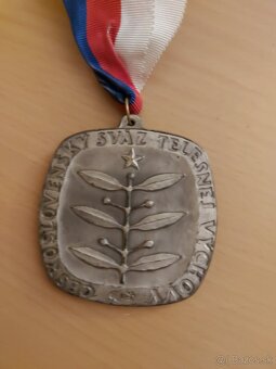 Medaila. - 2