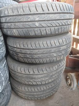 Predám letnú sadu pneu s diskami 185/65 r 14 orig. kia rio - 2