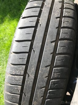 Predám pneu s diskami 165/70 R14 - 2