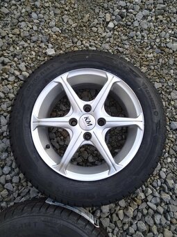 14" alu 4 x 100 + nové zimné 175/65 14. - 2