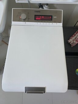 Práčka z hora plnená AEG L86560TL4 - 2