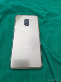 Samsung A8 2018 duos gold v peknom stave nosený v púzdre nal - 2
