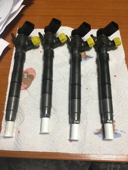 03N130277H Vstrekovač originál - 2