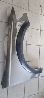 Blatník Audi A6 Allroad - 2