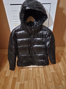 Dámska Páperová čierna lesklá nadýchana bunda L - M 22 € - 2