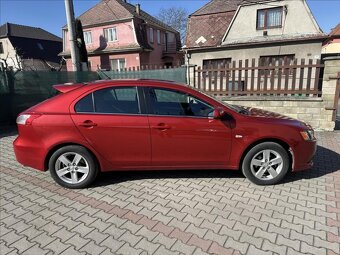 Prodám Mitsubishi Lancer 1.8 105kW 2009 119755km - 2