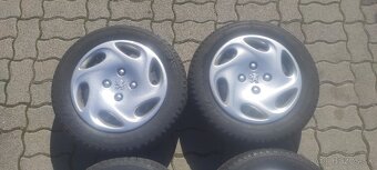 Peugoet puklice r14 - 2