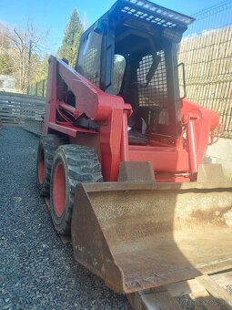 Šmykom riadený nakladač GEHL 3825 - 2