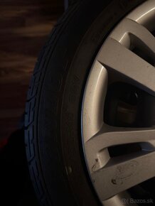 Mazda letne pneumatiky s diskami a puklicami - 2