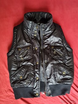 Zateplená dámska vesta - - 2