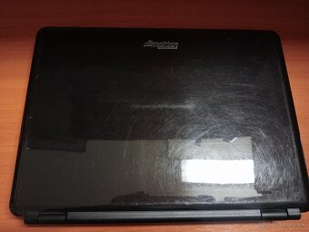 predám notebook DIMOTION FASTBOOK F4F1 , WINDOWS 7 - 2