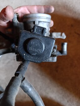 Škrtiaca klapka BMW e34 - 2