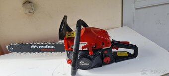 Predám novú silnú motorovú pílu s objemom 58cm3 s výkonom 57 - 2
