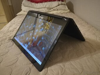 Asus. (2-v-1) konvertibilný notebook s dotykovým displejom. - 2