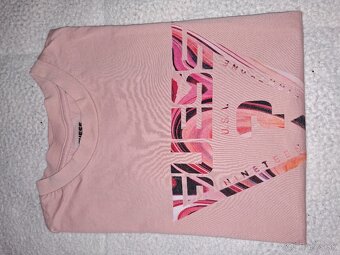 Predam Guess natelniky - 2