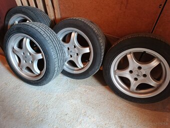 Disky RC-Design s pneu. 15" 4x100, 56mm - 2