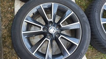 SADA ALU DISKOV 5X112 SKODA PNEU.225/50R17 98W BRIDGESTONE - 2