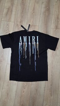Amiri Paint Drip logo - 2