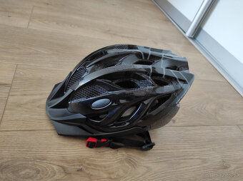 Prilba na bicykel - cierno siva. Ako nova. - 2