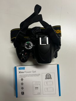Nikon D5100 + nový Newell Xtra Power set (nabíjačka + batéri - 2