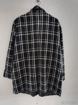 Dámsky kabát veľmi teplý. - 2