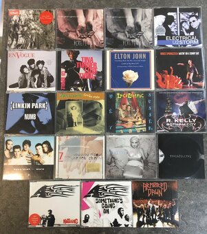 CD albumy + single - 2