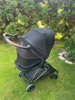 Cybex melio gold 2024 magic black - 2
