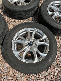 Letné pneu BRIDGESTONE 215/60 R16 na originál MAZDA diskoch - 2