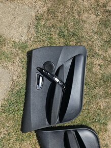 Tapacire dverí bmw e87 - 2