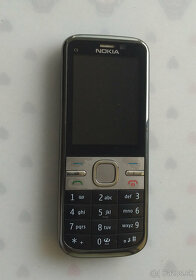 Nokia C5-00.2 RM-745, Sony ericson K320i - 2