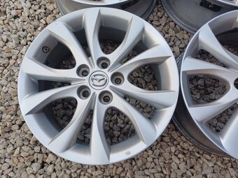 hlinikové disky org.Mazda 3,---7Jx17-ET-52,5---5x114,3 - 2