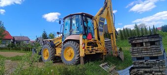 Predám komatsu wb 93 s - 2