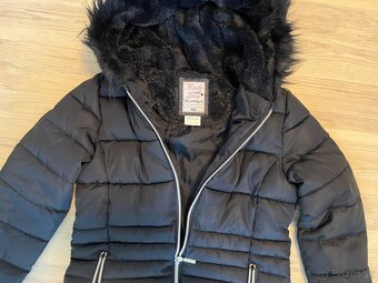 Tmavomodrá zimná bunda v. 146 - 2