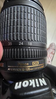 Nikon D3100 +Nikkor 18-105mm - 2