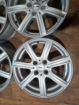 Predám hlinikové disky Peugeot/Citroen-R16 - 2