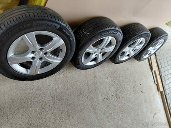 16" Peugeot + Michelin 215/60R16 - 2