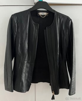 Damska kozena bunda. Pisane M , ale je to skor velkost 34/36 - 2