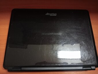 predám notebook DIMOTION FASTBOOK F4F1 , WINDOWS 7 - 2