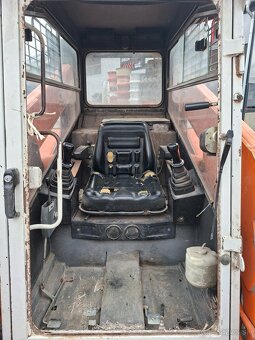 Predam Smykovy nakladac Unc locust 1203 - 2