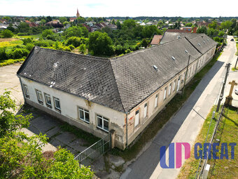 Areál v centre obce Jelka – 5287 m² - 2