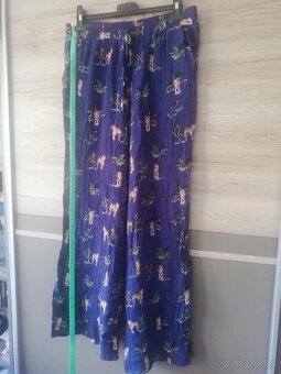 Taška plná dámskeho oblečenia - 2