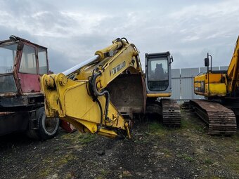 NEW HOLLAND E 215 - 2