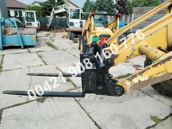 Predám nový rýchloupínač + paletizačné vidly na Komatsu WB - 2