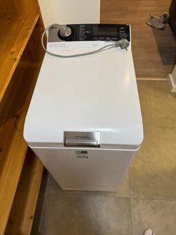 Práčka AEG 8000 series (zvrchu plnená) - 2