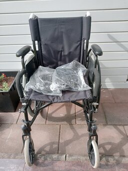 Invalidný vozík. - 2