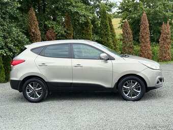 Hyundai ix35 Hnedy interier (polokoza) - 2