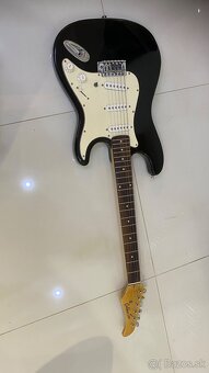 Predam elektrickú gitaru. - 2
