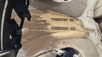puklice opel Corsa 4ks 15" - 2