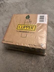 0,40€/kus Clipper zapalovace Camel - 2